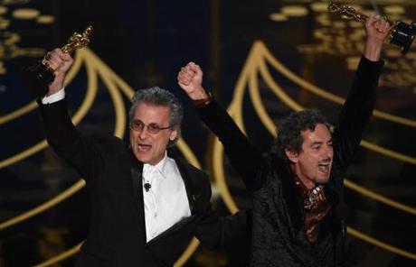 Mark Mangini, left, and David White accepted their award for best sound editing for ?Mad Max: Fury Road.?
